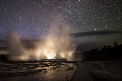 car-headlights-illuminate-the-steam-plume-from-excelsior-geyser-in-the-midway-geyser-basin-nps-neal-herbert-yellowstone-small